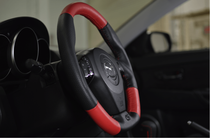 Increase your Mazdaspeed's handling and style with this new leather steering wheel.
