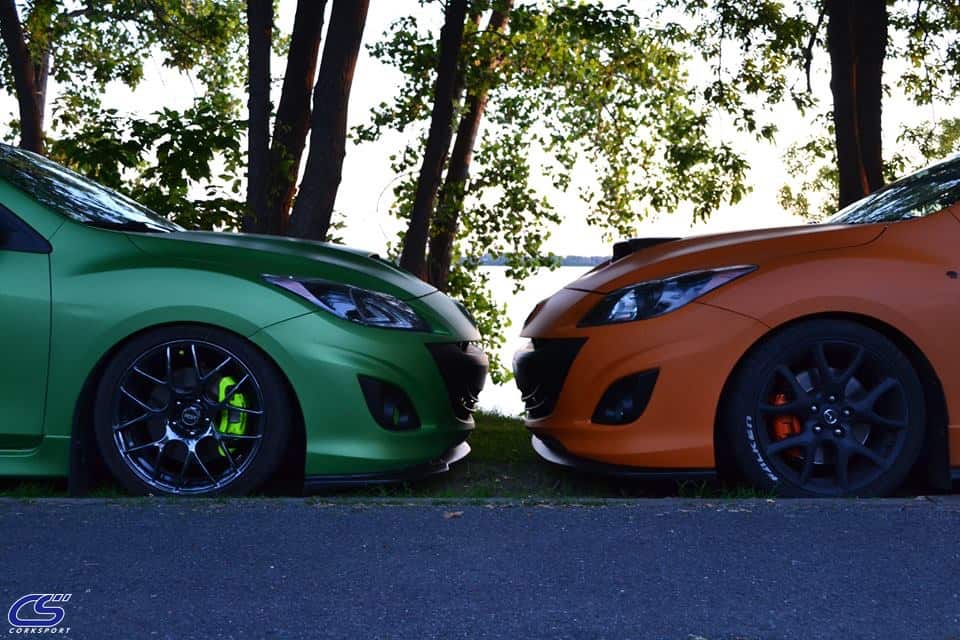 Mazda looking fresh with a green wrap and an orange wrap.