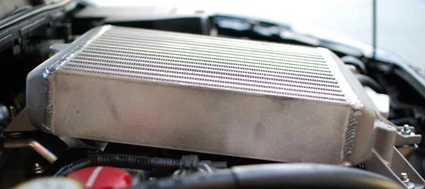 TMIC Top Mount Intercooler for Mazdaspeed 3 with 3.25 inches of thickness provides extra cooling capabiliites The TMIC, With 3.25 inches of thickness, the extra capacity allows significant cooling capabilities for your Mazdaspeed 3.